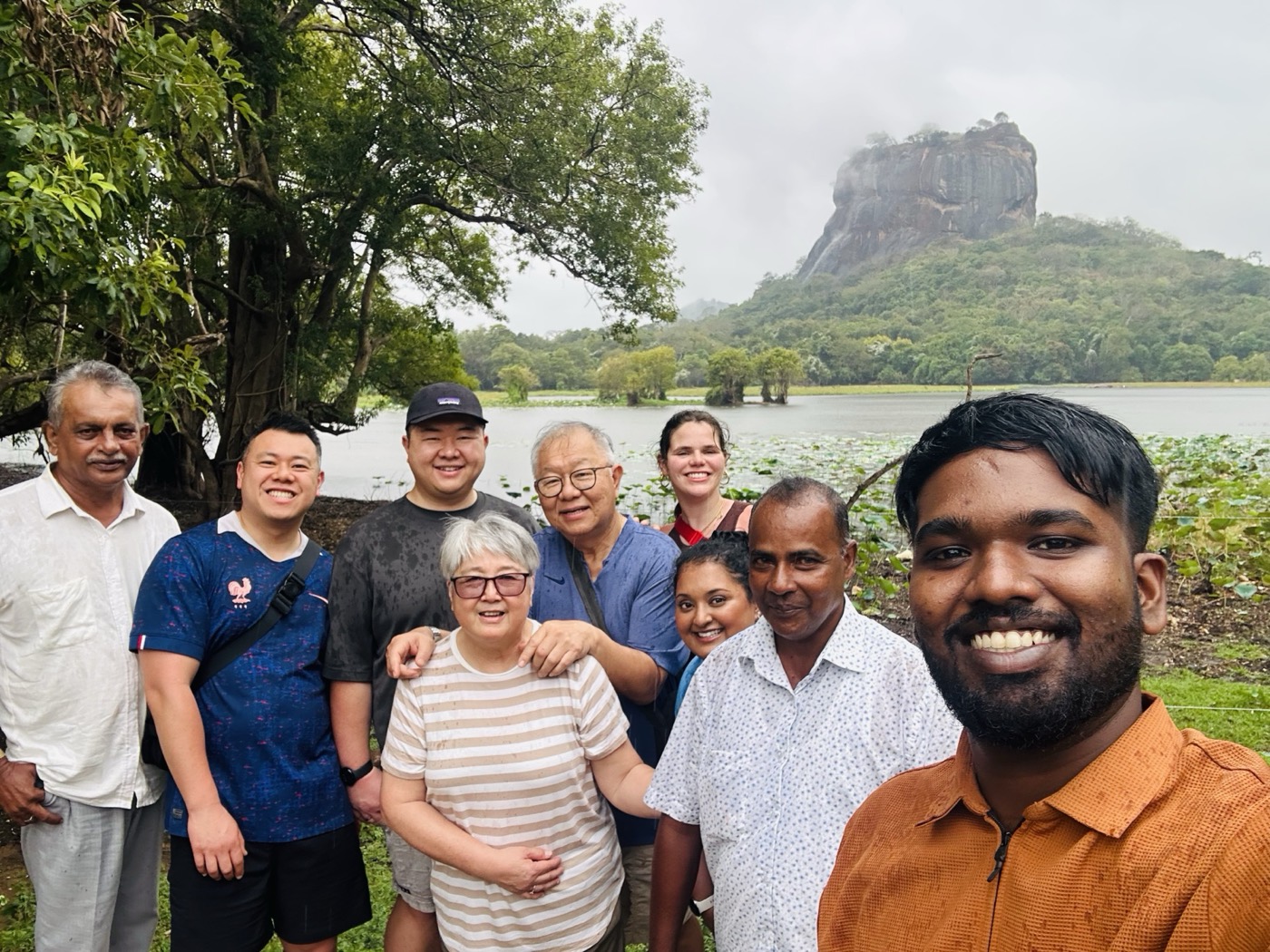 With a group of travellers, Sigiriya rock behind