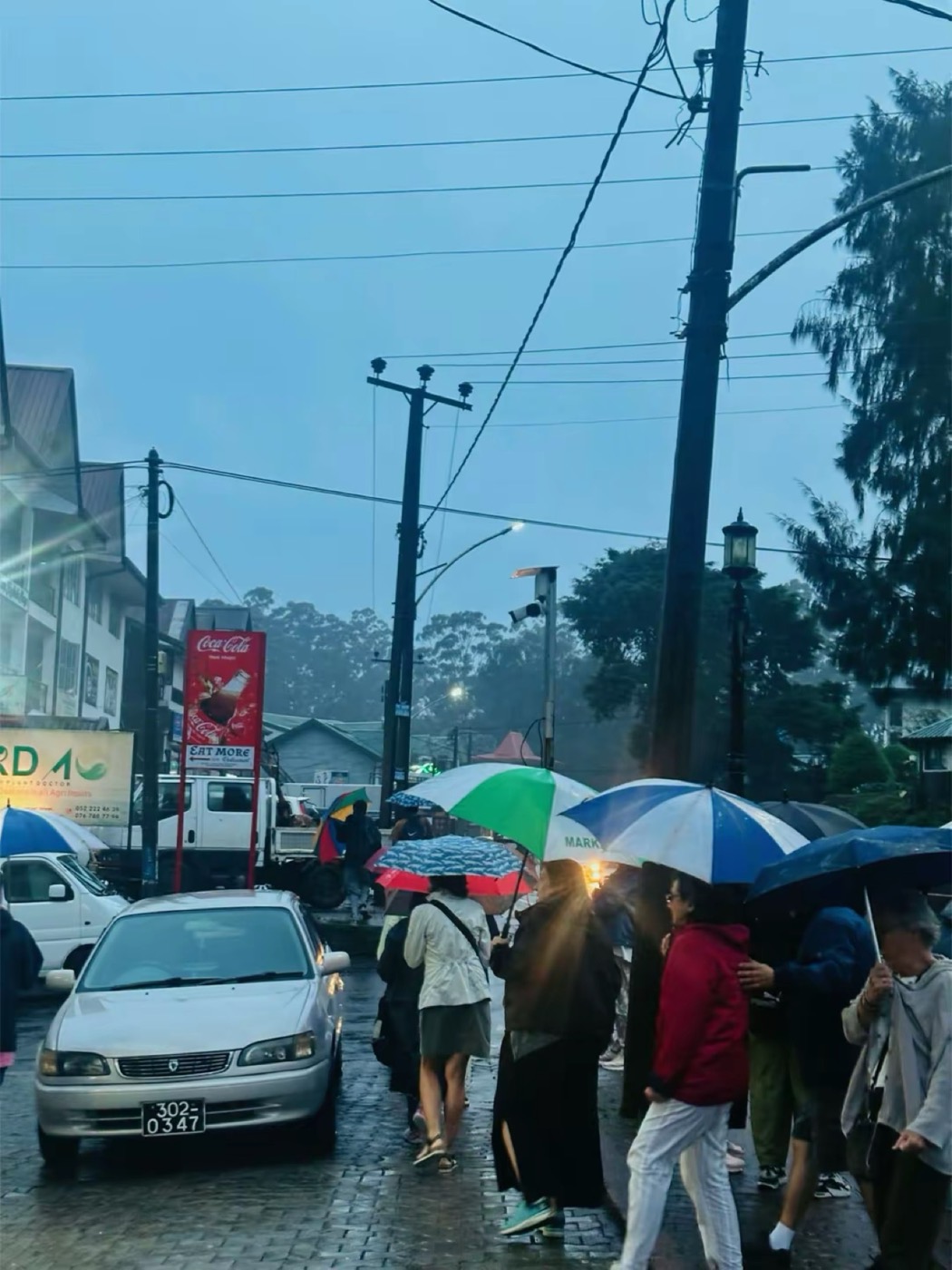 A rainy hill-town street
