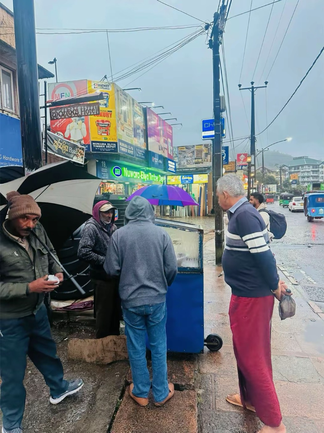 Umbrellas at the bus stop