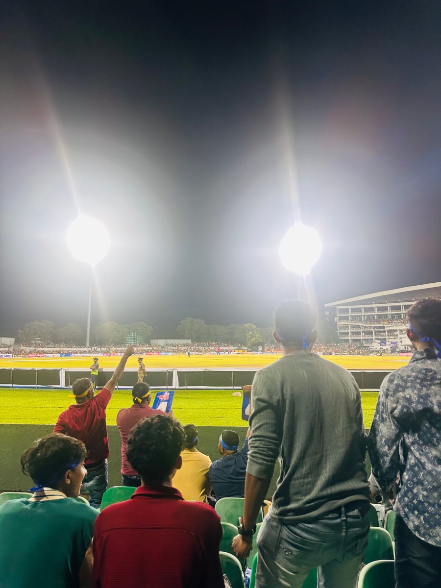 Under the stadium floodlights